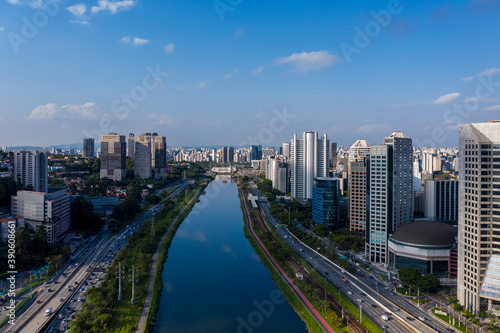 View of Marginal Pinheiros with the Pinheiros river and modern buildings in Sao Paulo, Brazil © Erich Sacco