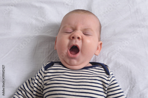 relaxed baby yawning