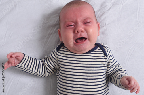 a baby that cries inconsolably photo