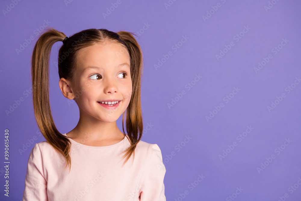 Close up portrait of interested little person look empty space pastel pullover isolated on purple color background Close up portrait of interested little person look empty space pastel pullover isolated on purple color background