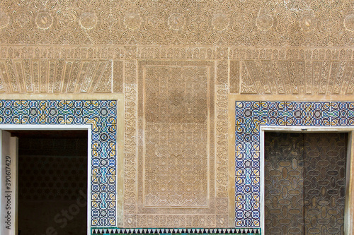 two doors of the alhambra with decorated wall