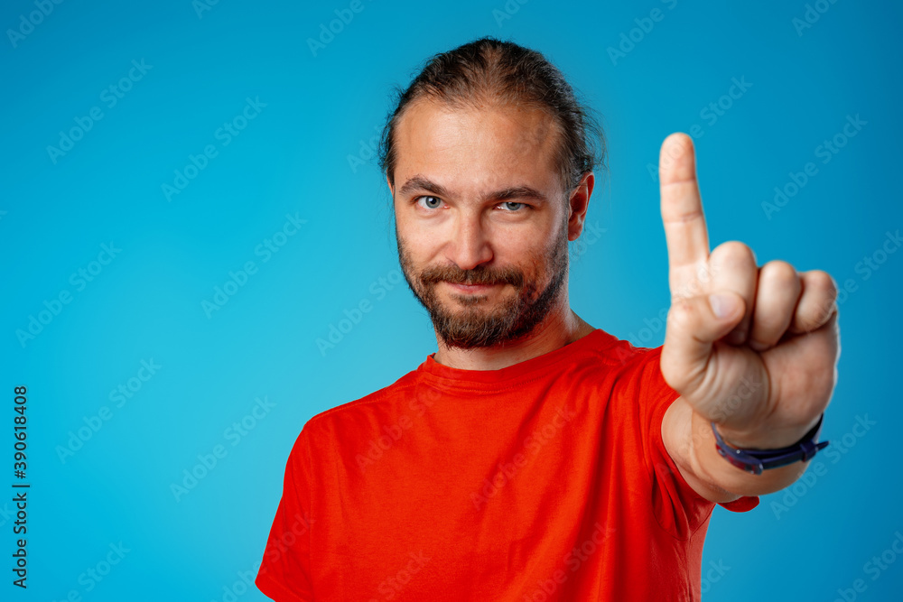 Bearded man gesturing 'stop' or 'wait a minute Bearded man gesturing 'stop' or 'wait a minute