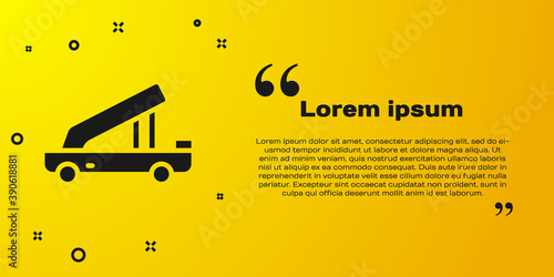 Black Passenger ladder for plane boarding icon isolated on yellow background. Airport stair travel. Vector.