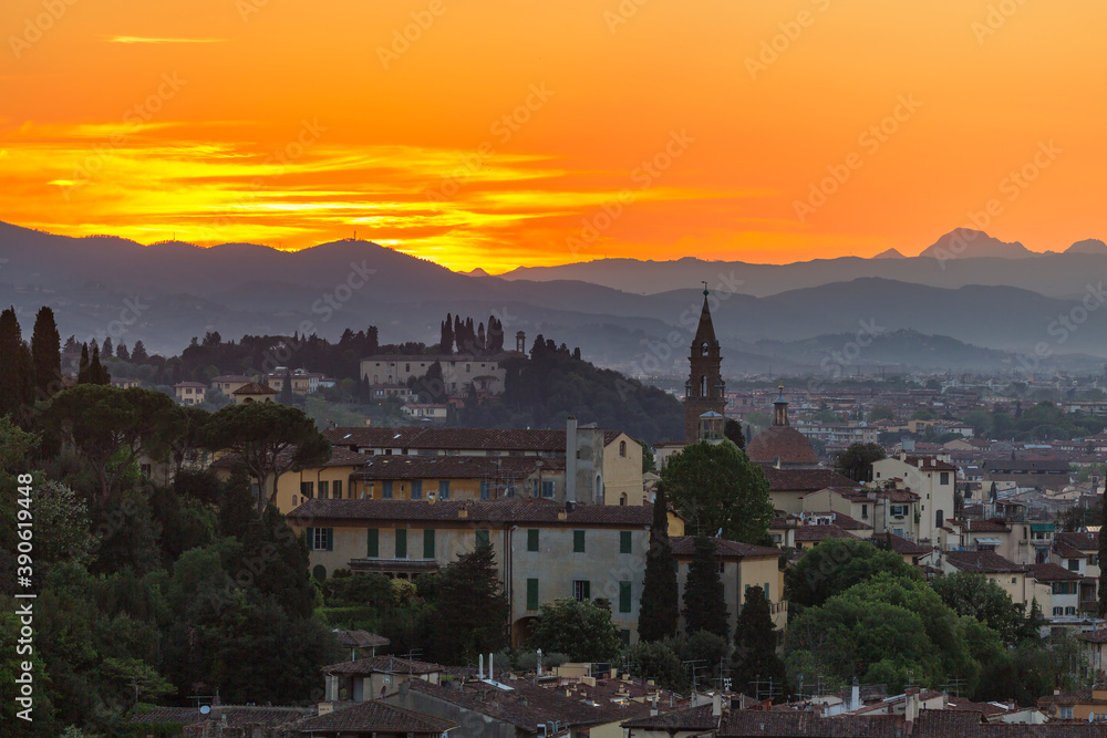 View at Florence in sunset light with the mountains