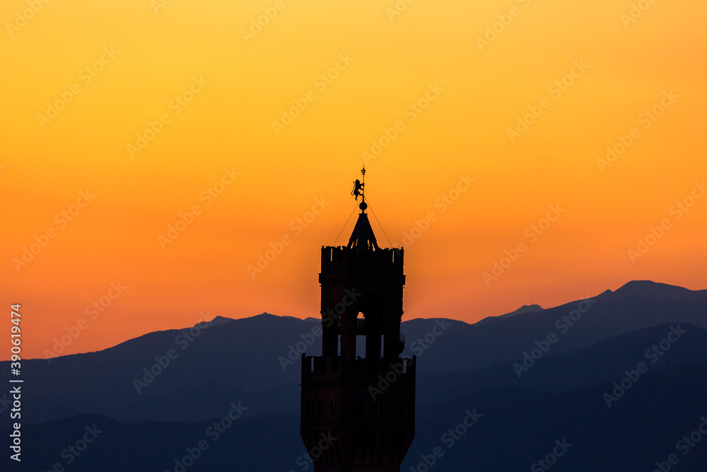 Sunset view at Palazzo vecchio tower in Florence Sunset view at Palazzo vecchio tower in Florence