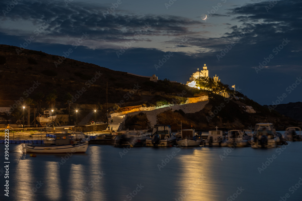 View of the Agia Irini, Saint Irene, Greek Orthodox church at night. Beautiful illumination, Chora, Ios, Greece.