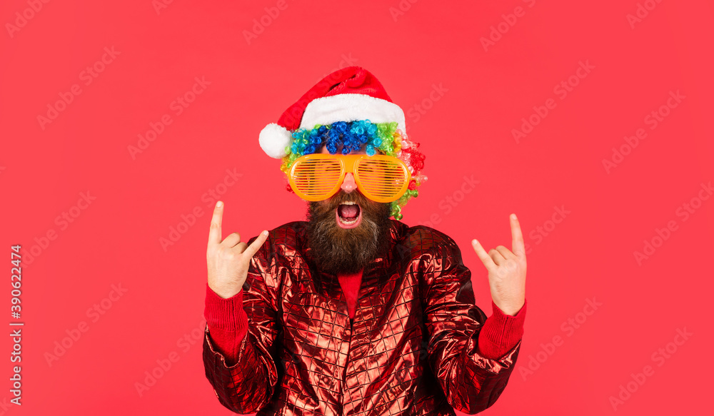 Funny man with beard. Christmas spirit. Cheerful clown colorful hairstyle. Winter holidays. Sorry Santa, Naughty just feels Nice. Bearded man celebrate christmas. Christmas party entertainment