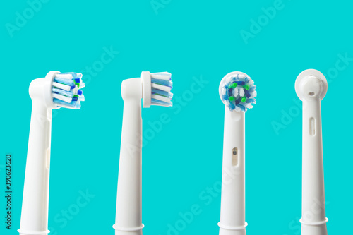 Electronic toothbrush isolated on green background