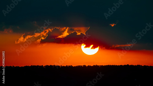 Colorful sunset in the evening sky. The nature and beauty of clouds