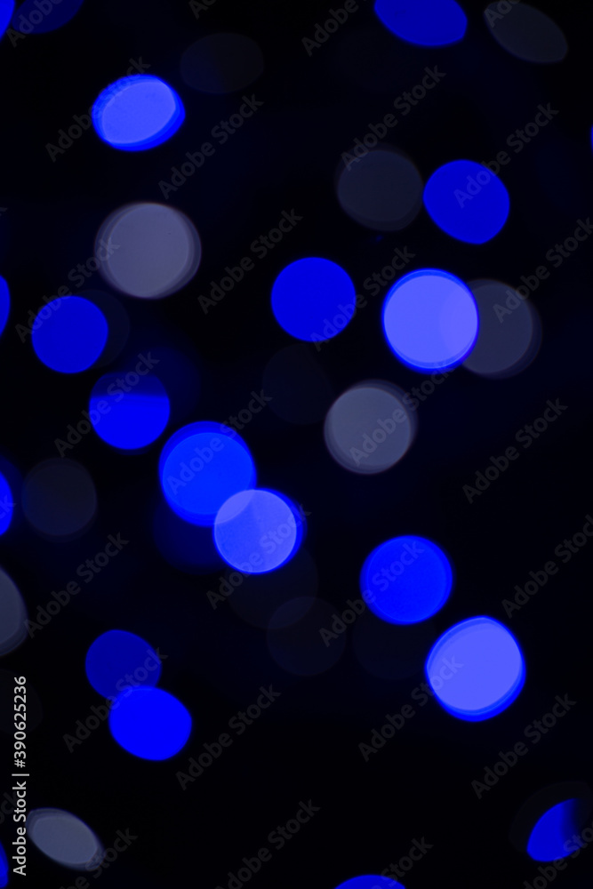 Abstract blue bokeh texture on black background Abstract blue bokeh texture on black background