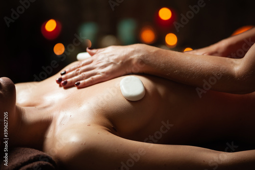 Wallpaper Mural Young beautiful woman having massage in spa salon Torontodigital.ca