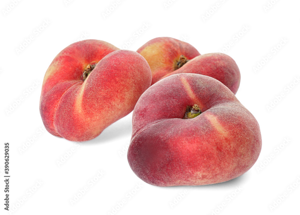 Fresh ripe donut peaches on white background Fresh ripe donut peaches on white background