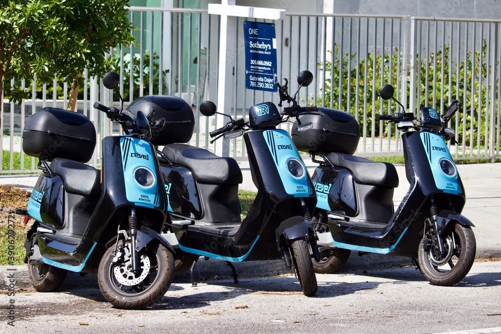 3/5/2020 Miami FL Multiple Revel electric mopeds on a street in a
