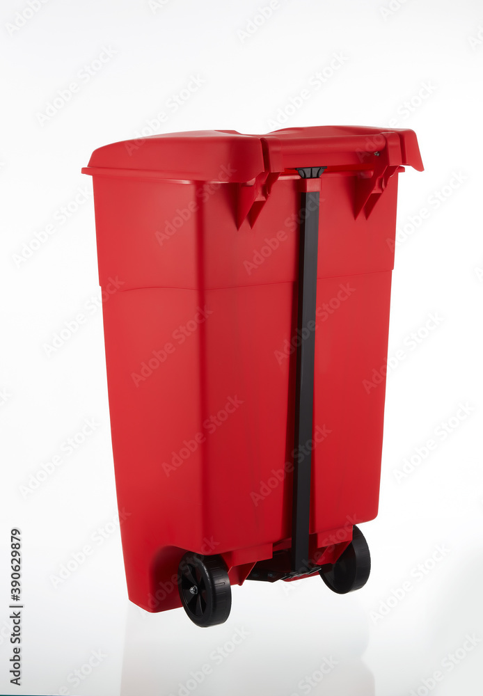 A picture of a large red rubbish bin with wheels on A picture of a large red rubbish bin with wheels on