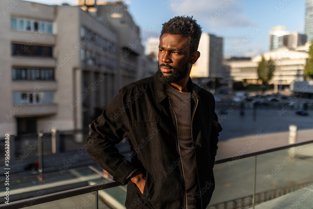 Young handsome man portrait outdoors in the street Young handsome man portrait outdoors in the street