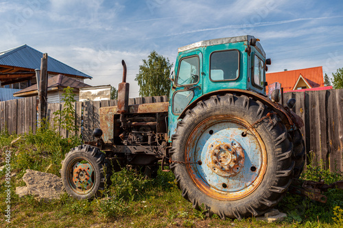 Old, broken, rusty tractor Belarus