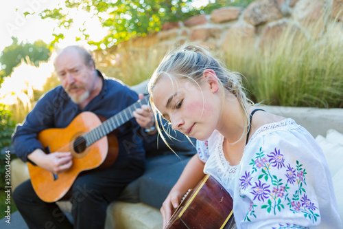 11 year old girl playing guitar photo