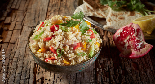 Mixed quinoa and couscous salad with pomegranate