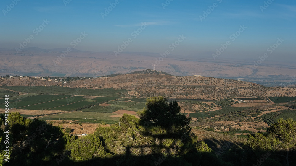 Naftali mountains range with keren naftali mountain, Hula valley, Golan Heights and Mount Hermon as seen from Kibbutz Malkia lookout point, located on iraeli-lebanese border in Upper Galilee, Israel.