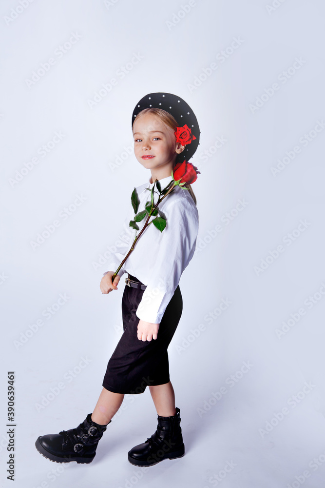Fototapeta premium cute five year old girl in a black beret and formal clothes