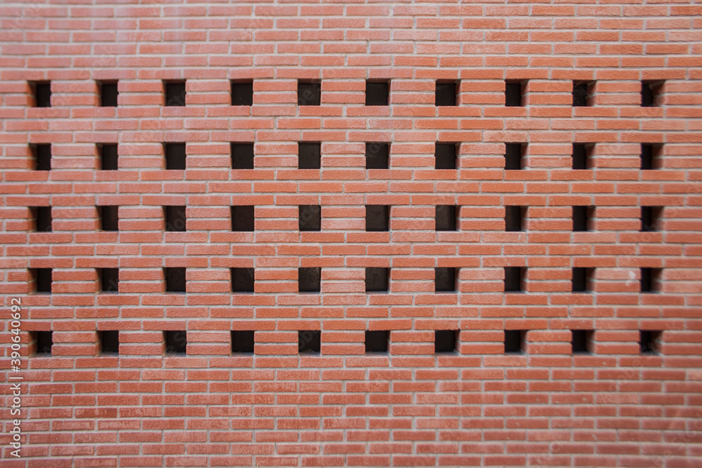 Front view of a brick facade wall. Arabian brick work technique.