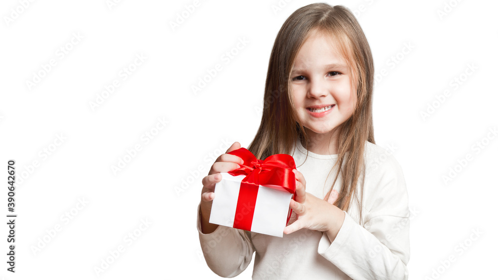 Happy laughing little girl, preschooler holding birthday present, gift box with red bow. excited and surprised. a forced, insincere smile. bad gift, disappointment. on white background. Happy laughing little girl, preschooler holding birthday present, gift box with red bow. excited and surprised. a forced, insincere smile. bad gift, disappointment. on white background.