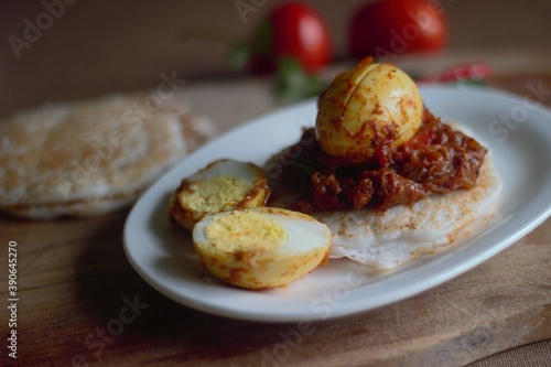 Rice pancake and egg roast, a traditional rice based breakfast dish of Kerala photo