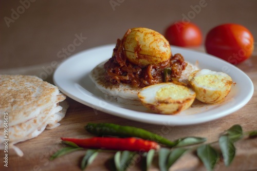 Rice pancake and egg roast, a traditional rice based breakfast dish of Kerala photo