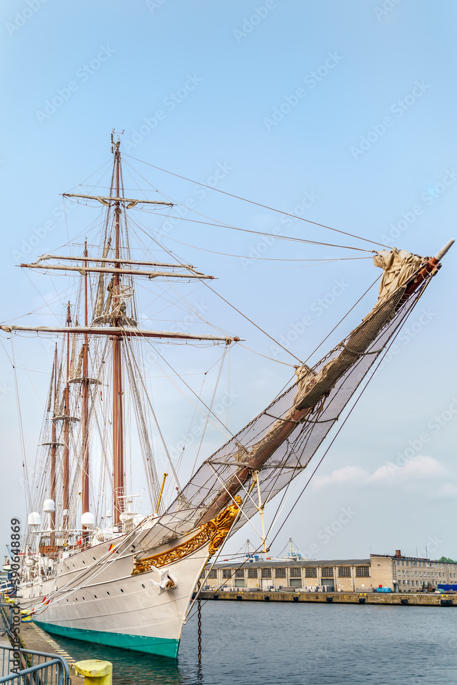 Ship bow of famous tall ship Juan Sebastian de Elcano, a training ship of the Spanish Navy moored at Chrobry Shafts pier Ship bow of famous tall ship Juan Sebastian de Elcano, a training ship of the Spanish Navy moored at Chrobry Shafts pier