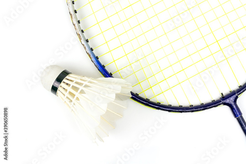 White shuttlecocks and racket badminton isolated on white background.  © Alongkorn