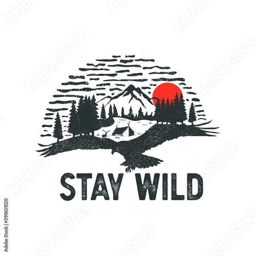 Hand drawn wilderness badge with mountain landscape and inspiring lettering 