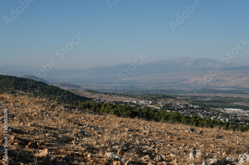 View of Hula Valley with Rosh Pina town and the Galan Heights in the east, Mount Hermom in the north and Lake Kinneret in the south as seen from Mount Canaan slopes, Upper Galilee, Israel. 