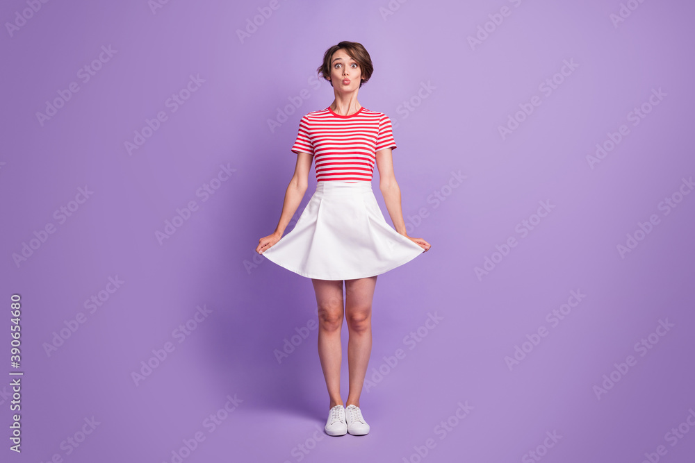 Full length photo of girl send air kiss funny pose wear striped t-shirt mini skirt footwear isolated violet color background