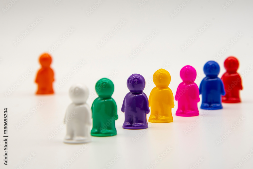 Small plastic men on a white background. Small plastic men on a white background.