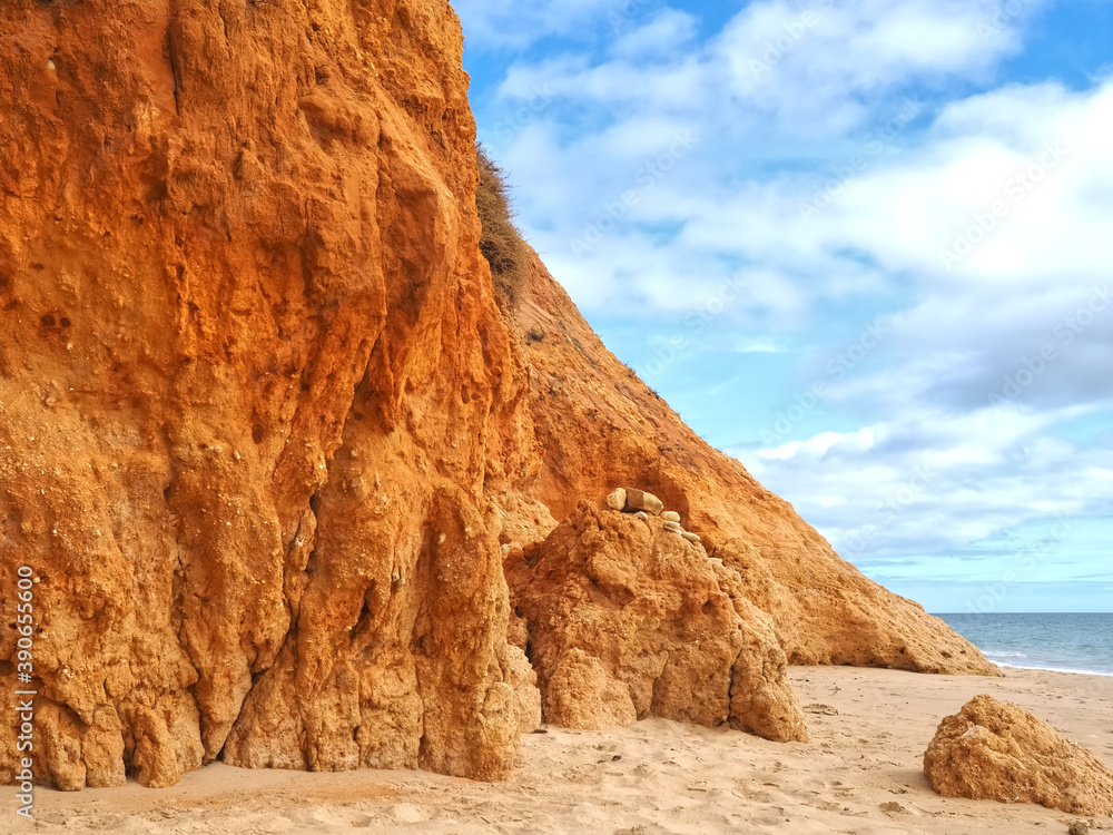 Beautiful Algarve beach with red cliffs, Olhos de Agua, Albufeira
