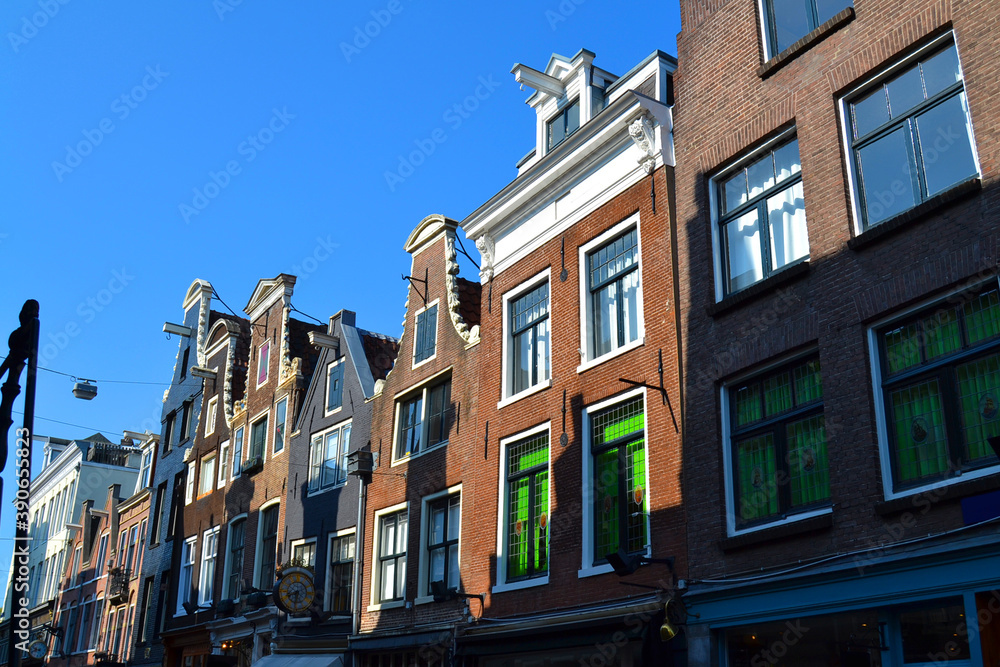 Traditional dutch architecture, facades of houses in Amsterdam, The Netherlands.