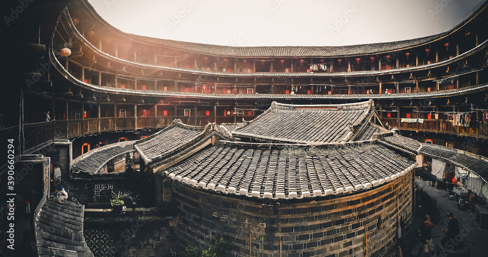 FUJIAN, CHINA – MARCH 2, 2018: A panoramic wide angle view of Tulou courtyard,Tulou is the unique traditional rural dwelling of Hakka.