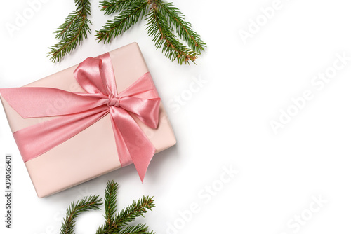 gift box and Christmas tree branches isolated on white background with copy space.