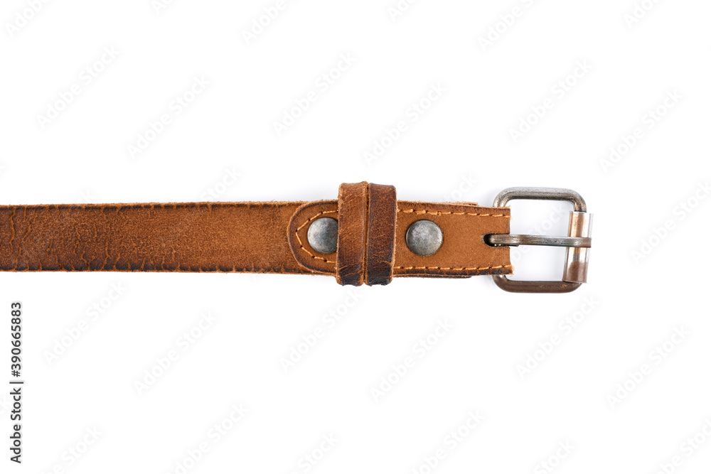 Old leather men's belt on a white background. Brown belt for men. Brown leather belt for trousers and jeans. Male accessory. Vintage things. Old leather men's belt on a white background. Brown belt for men. Brown leather belt for trousers and jeans. Male accessory. Vintage things.