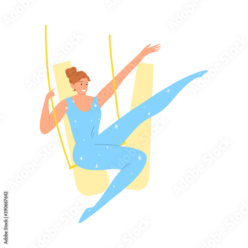 Smiling girl aerialist in blue costume during performance in circus