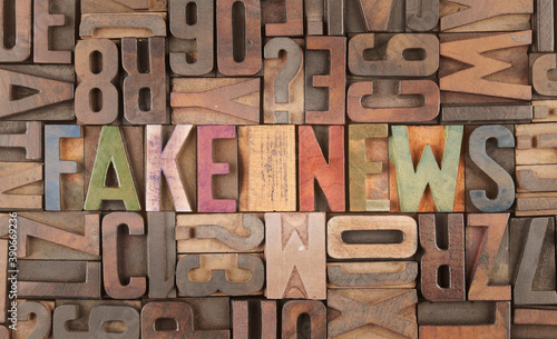 fake news words in vintage letterpress wooden blocks