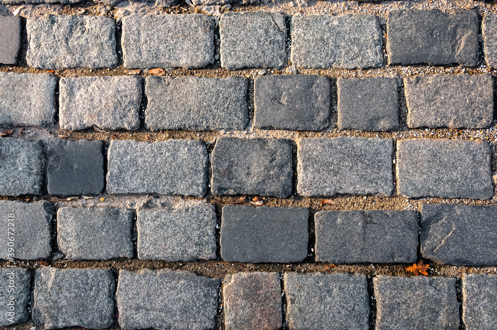 The road is paved with stone, paving stones. The road is paved with stone, paving stones.