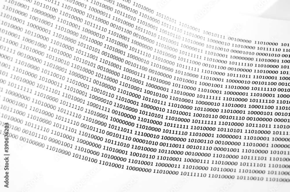 Obraz premium Binary code printed in black on a white sheet of paper, binary code background and texture.