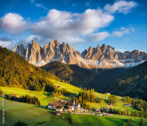 Santa Maddalena, Val di Funes, Italy. Most popular place in Italy. Classical landscape in summer time in Dolomite Alps. Travel image.