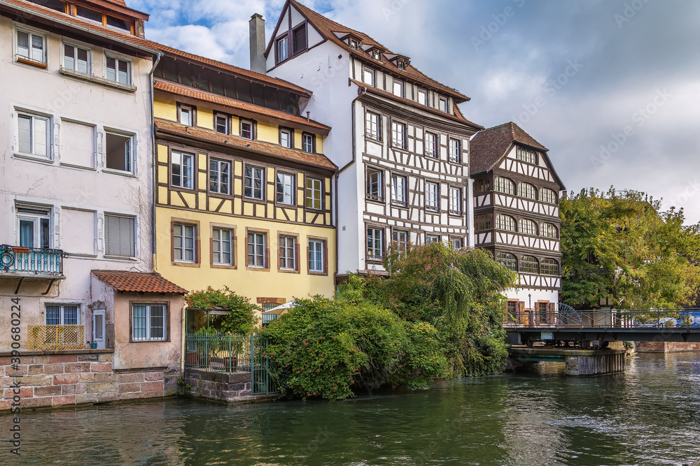 Historic houses on the embankment of the Ill river in  Petite France district in Strasbourg, France