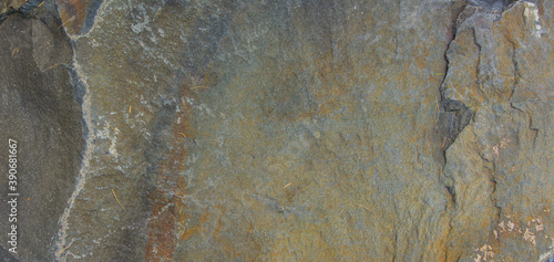 The texture of the natural stone is grayish-yellow in color.