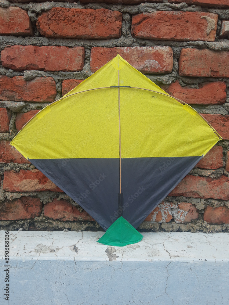 Indian kites and spool used in the very popular sport of kite fighting. These are traditionally used on Makar Sankranti or Independence day