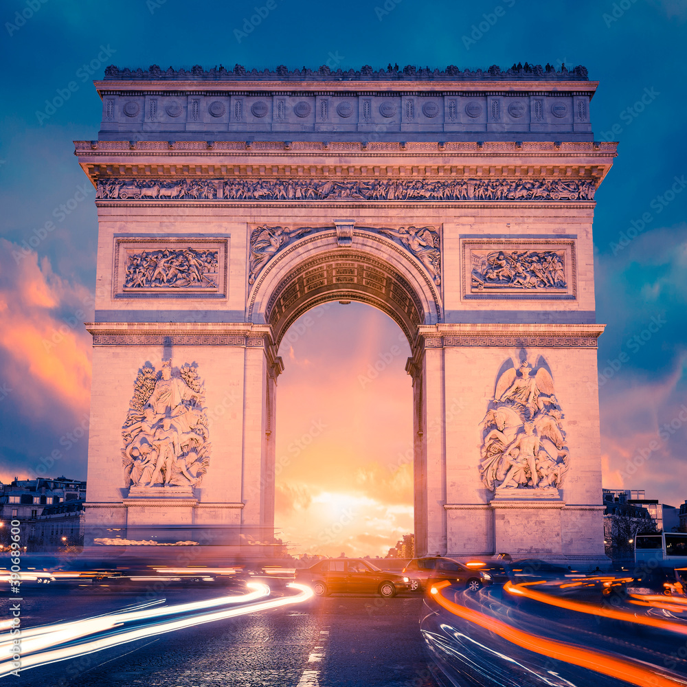 View of famous Arc de Triomphe at sunset