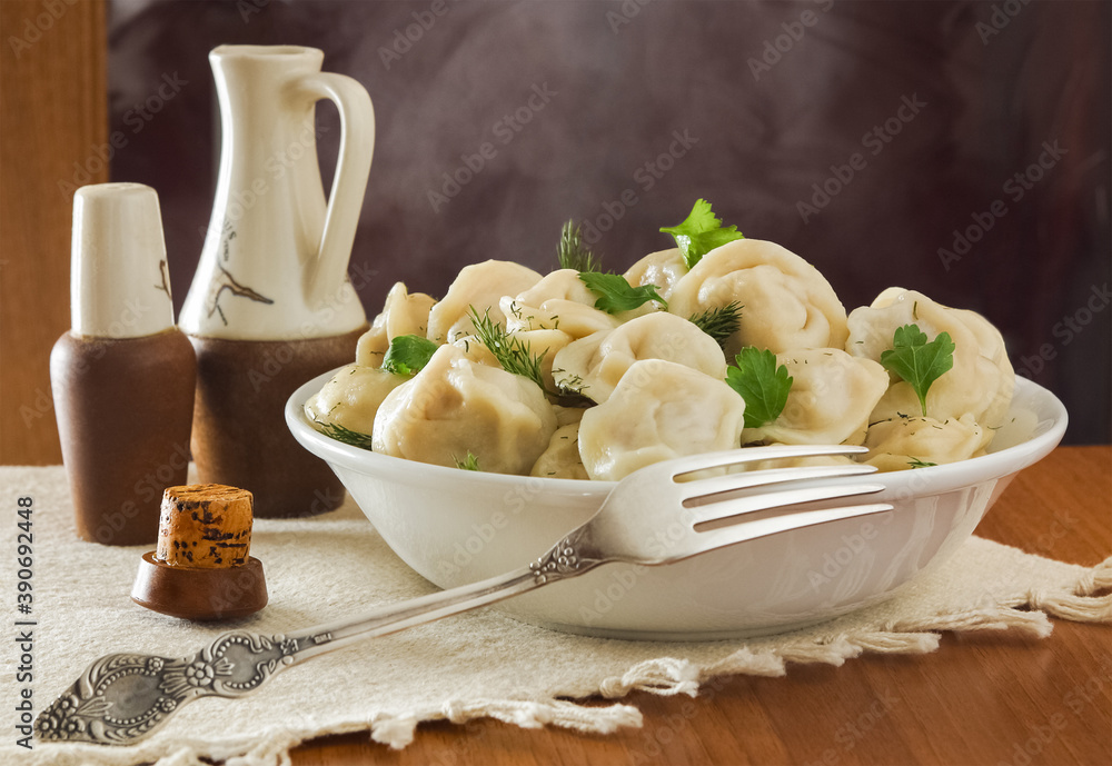 Homemade delicious just steamed dumplings with meat in a rustic style