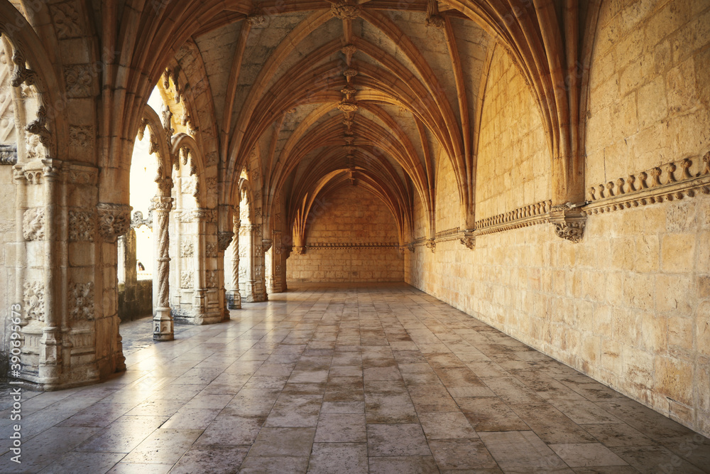 Archway of an old monastery. Cloisters of Jeronimos Monastery. Lisbon Portugal